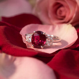Platinum 2.55 Oval Ruby .56 Diamond 3 Stone Ring