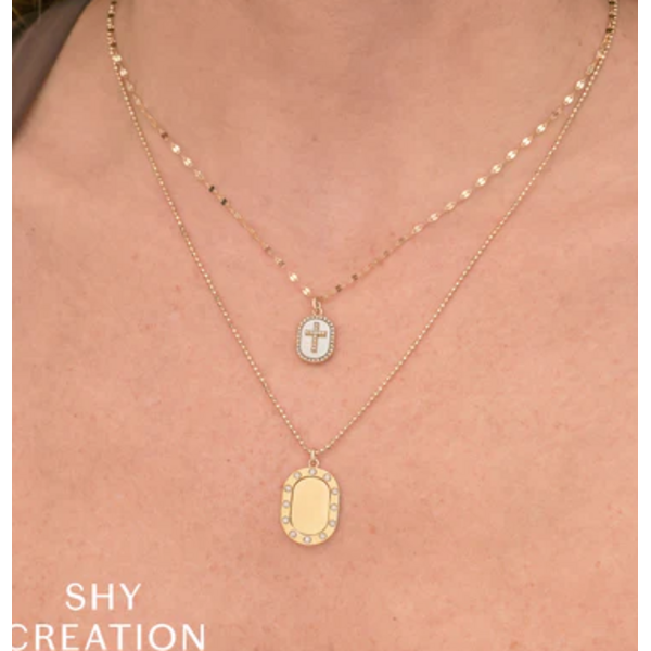 SHY CREATION INC SC55028759 - 14 ky .11 Dia and .95 MOP Oval Cross Pendant