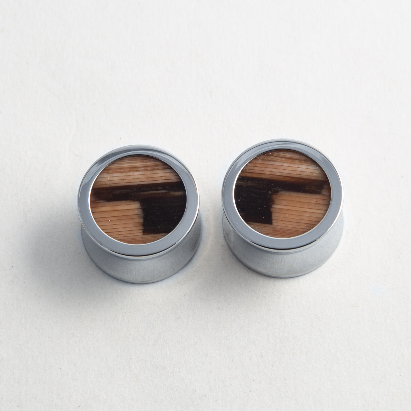Reign Custom Design Reign 3/4 steel double flared plugs with 2-tone petrified wood cabochon