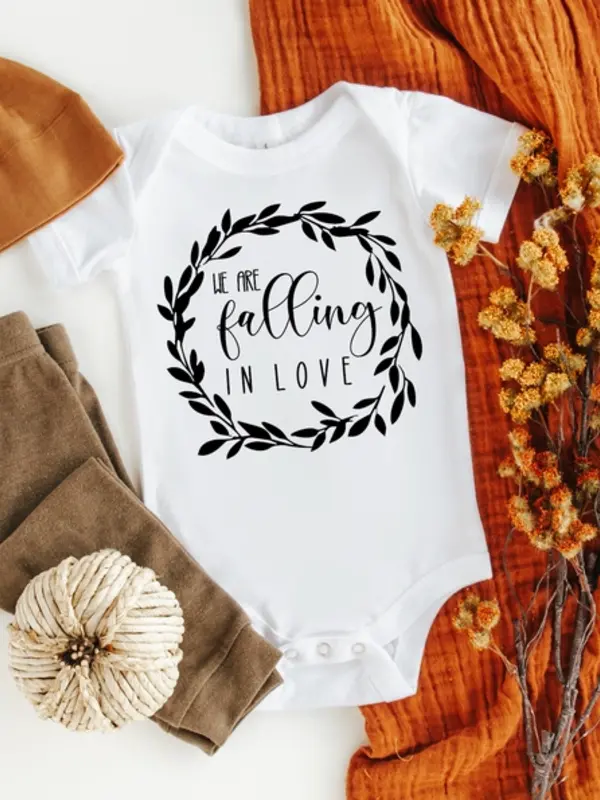 Claire + Bella We're Falling in Love Announcement Onesie NB