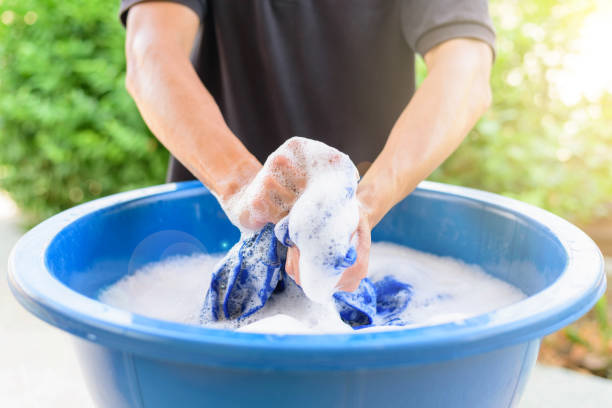 lukewarm soapy water in a basin