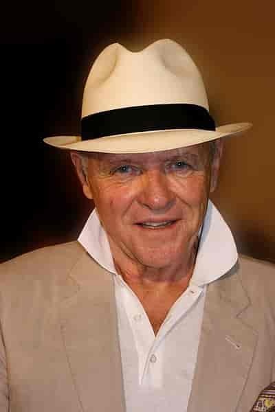 Man wearing Panama hat matching his suit