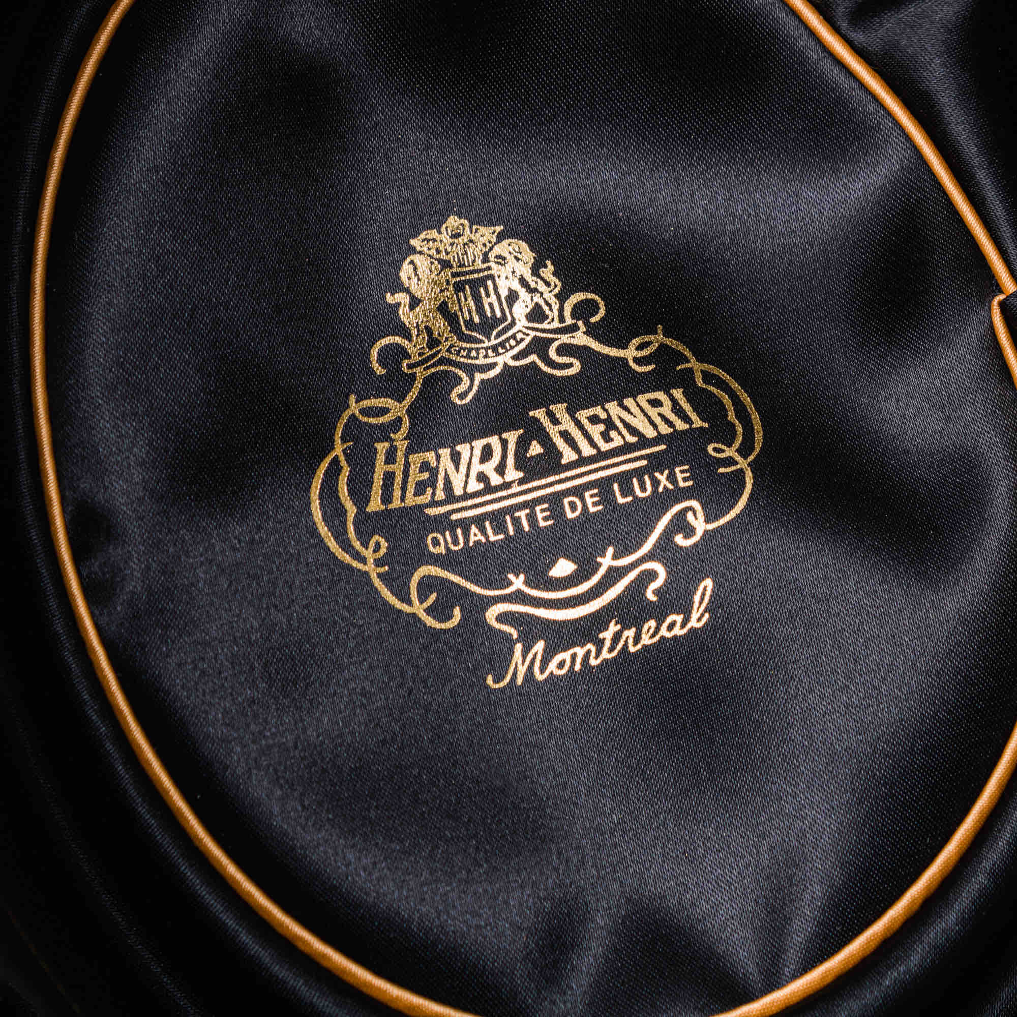 Lining in black satin written Henri Henri Montreal 1932 in gold lettering inside the hat