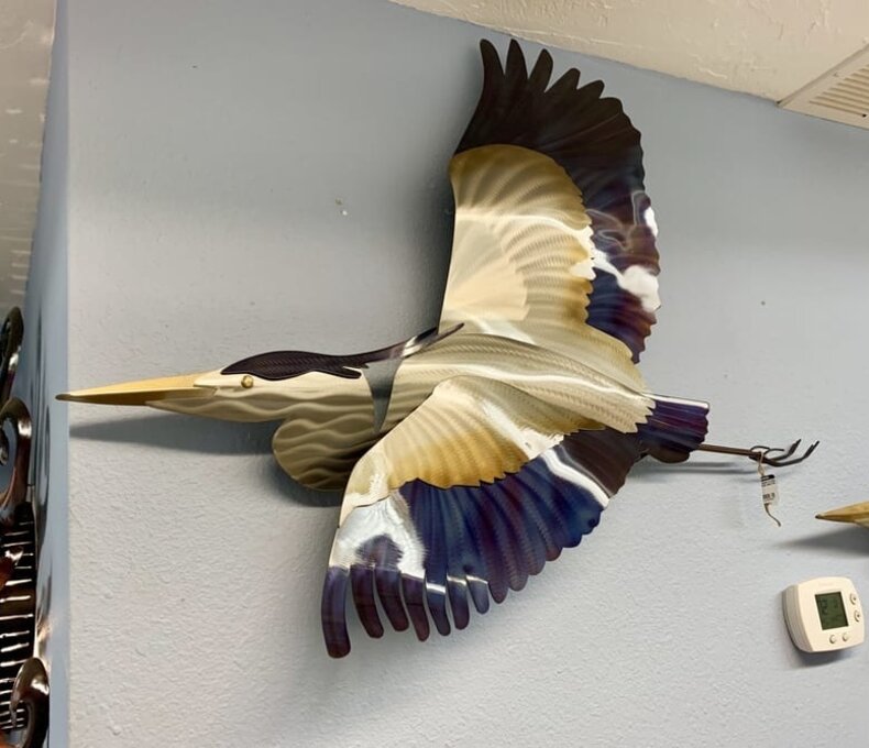 BLUE HERON FLYING