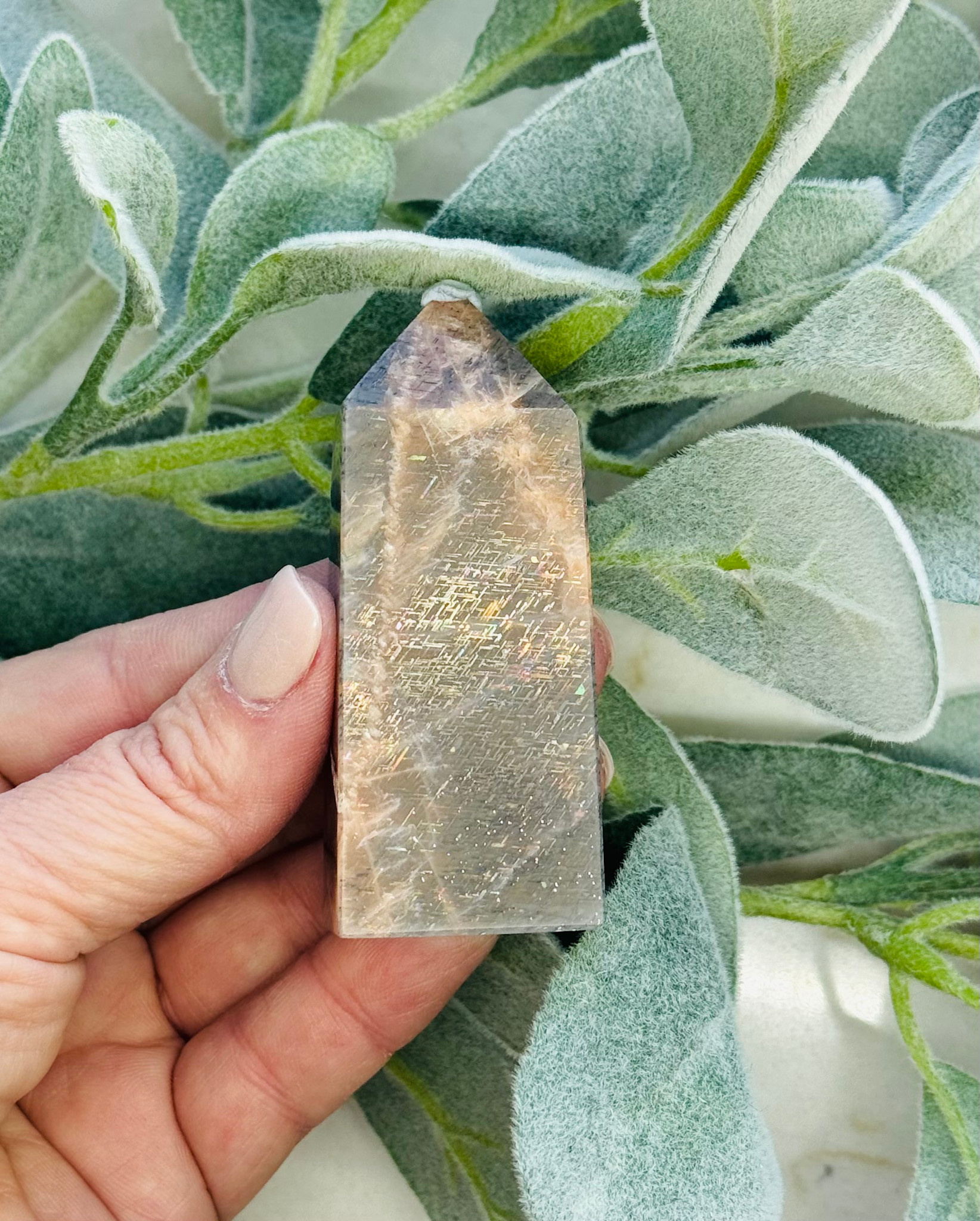 black-sunstone-with-rainbow-