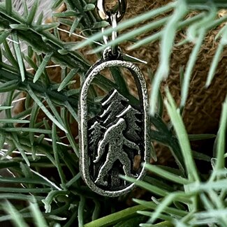 Bigfoot Big Foot Keychain - Bigfoot in Trees Oval Shape Silver Color