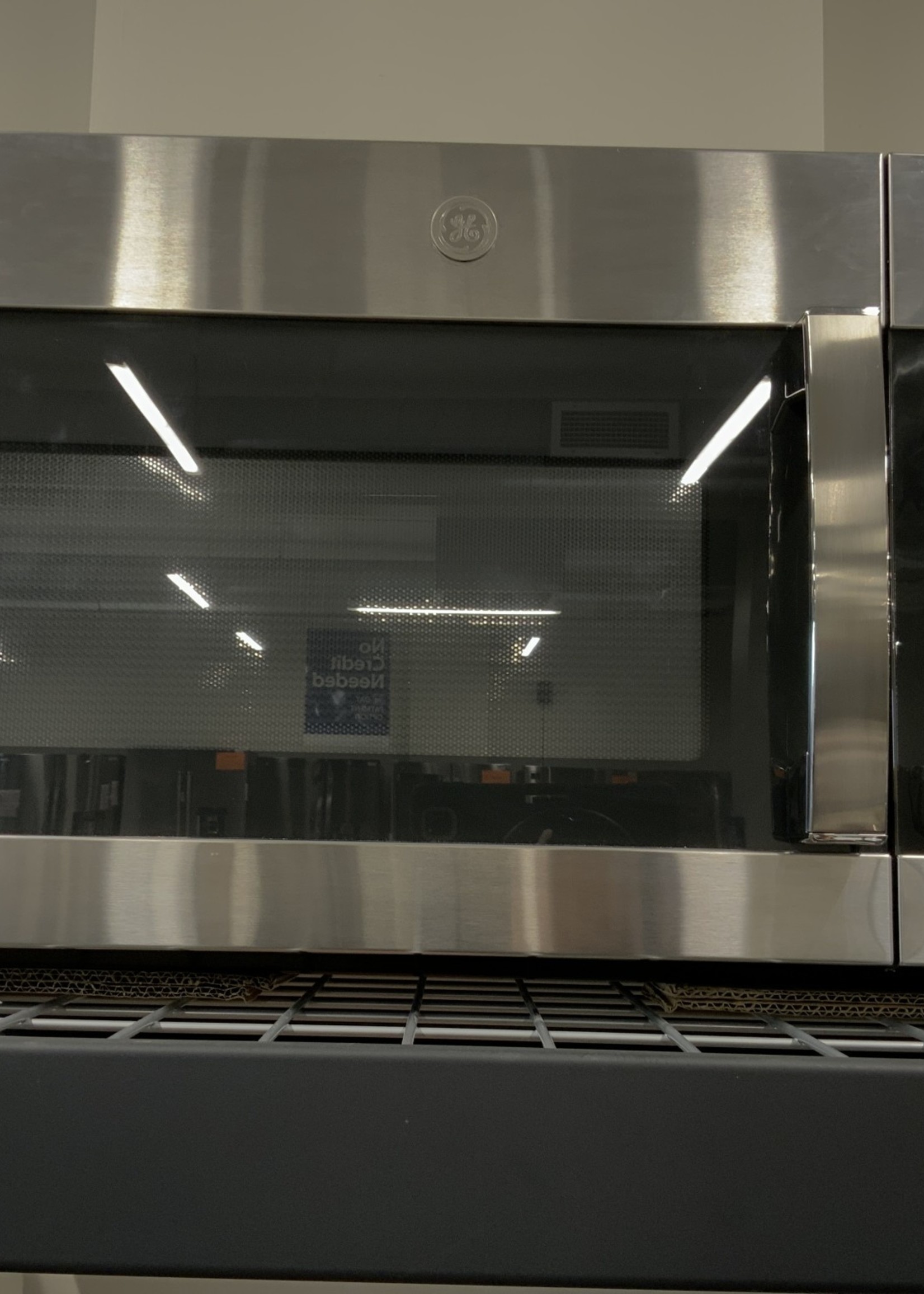 GE GE 1.7 Cu. Ft. Over-the-Range Microwave Oven