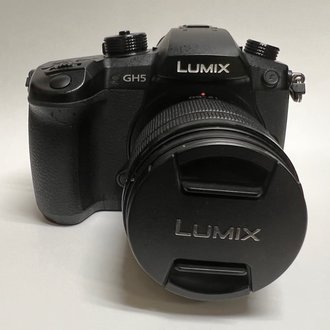 Panasonic USED Panasonic Lumix DC-GH5 Mirrorless Micro Four Thirds Digital Camera w/ 12-60 3.5-5.6 Lens Panasonic USED Panasonic Lumix DC-GH5 Mirrorless Micro Four Thirds Digital Camera w/ 12-60 3.5-5.6 Lens