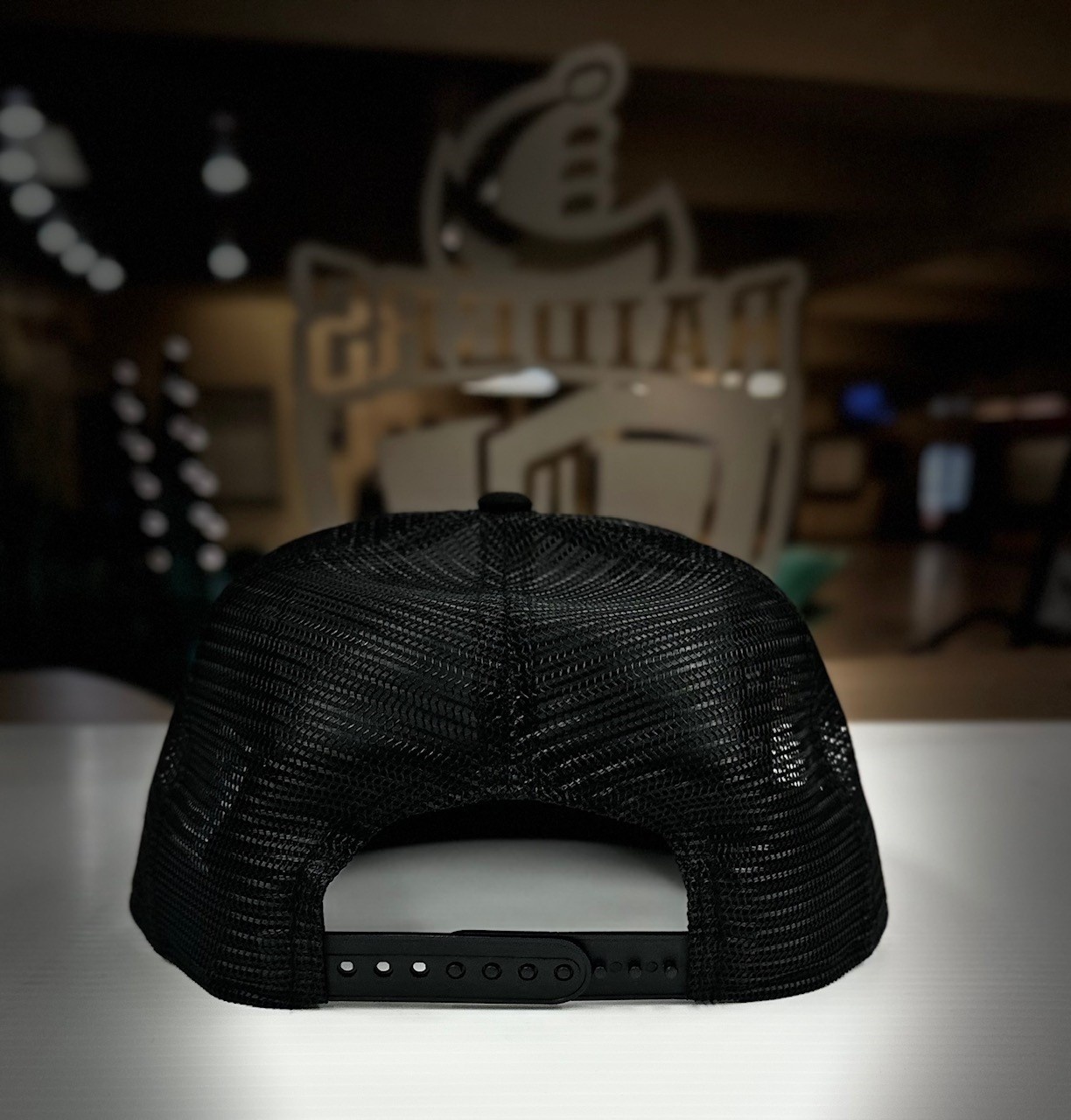 NE Raider BlackTrucker Hat 950