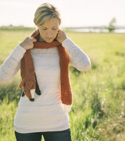 person with fox scarf