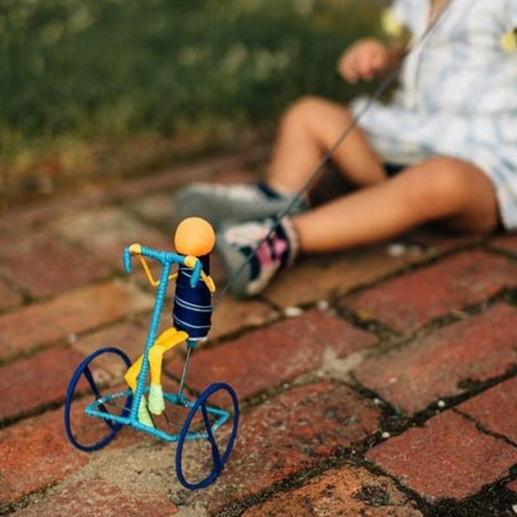 Ten Thousand Villages Galimoto Short Hair Cyclist
