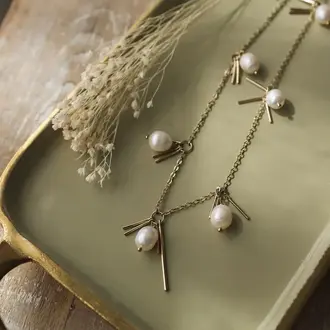 Wild Abandon Gold plated Mardi Gras necklace / white pearl