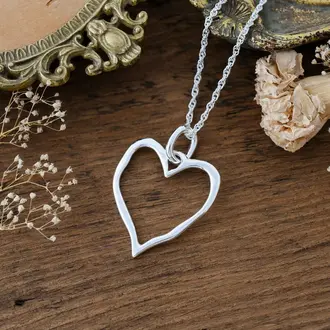 Wild Abandon Silver plated Giving Heart necklace