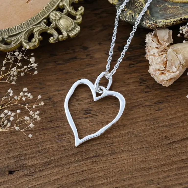 Wild Abandon Silver plated Giving Heart necklace
