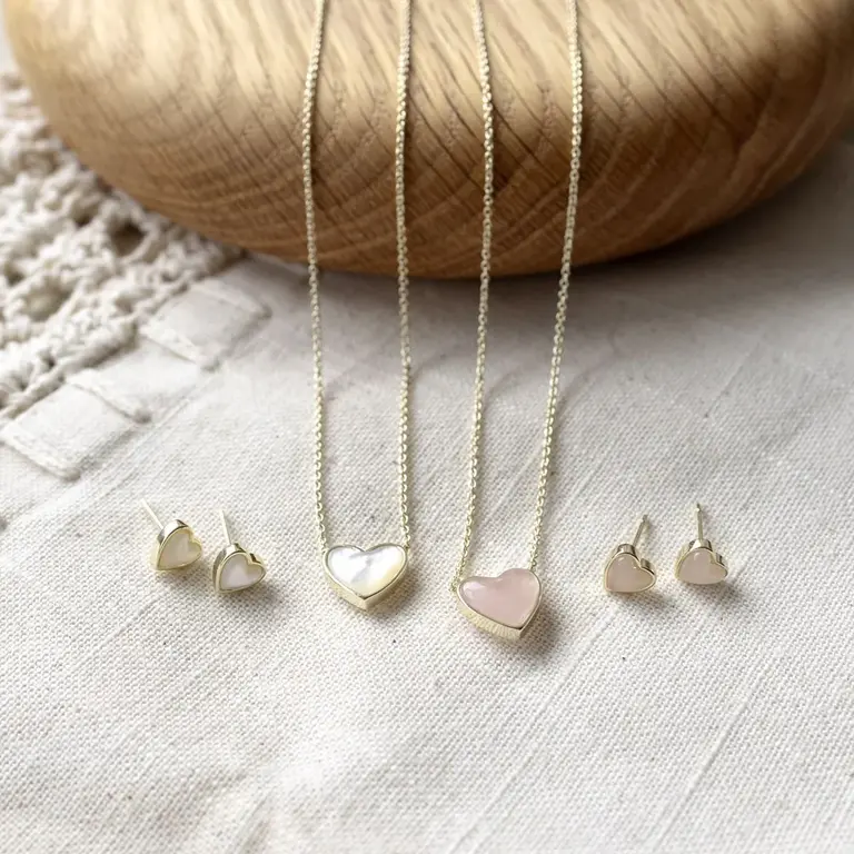 Wild Abandon Gold plated Heart of Stone studs / rose quartz