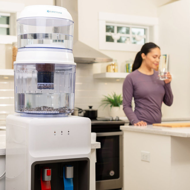 DISPENSER GRAVITY WATER SYSTEM WITH FLOURIDE FILTER