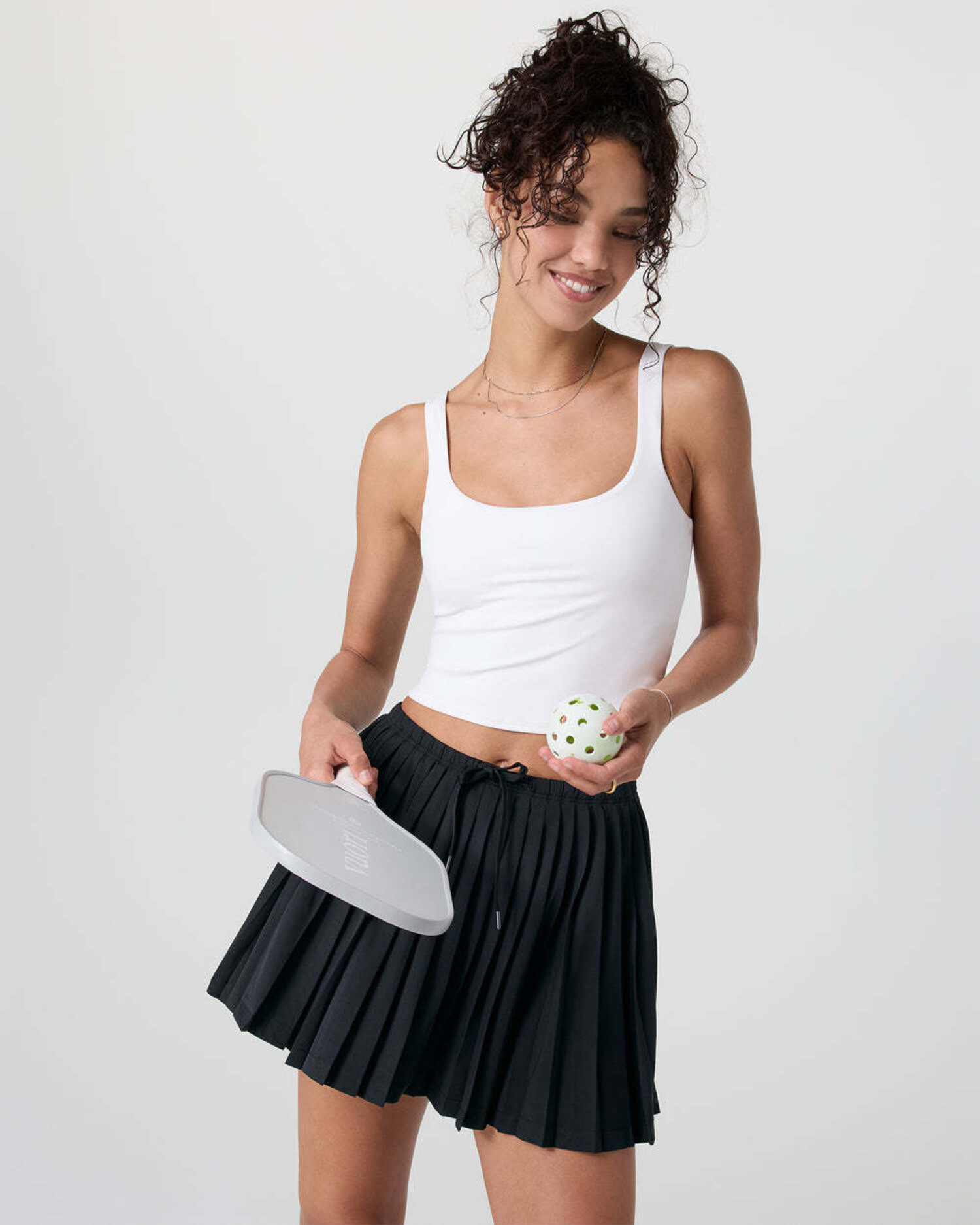 Vuori Clementine Pleated Skirt (Womens) | Black - The Drop Rideshop