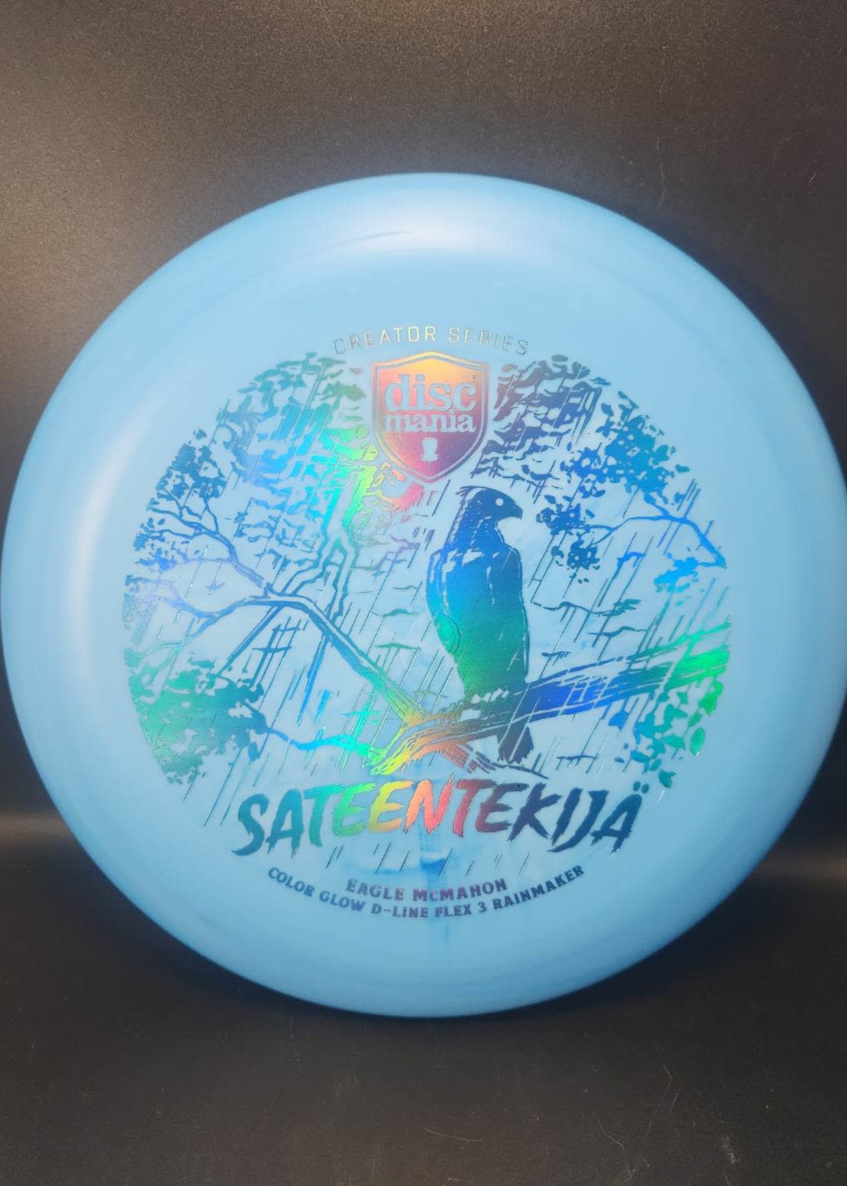 Discmania Discmania - EAGLE MCMAHON FINNISH HERITAGE SERIES COLOR GLOW D-LINE RAINMAKER (FLEX 3)