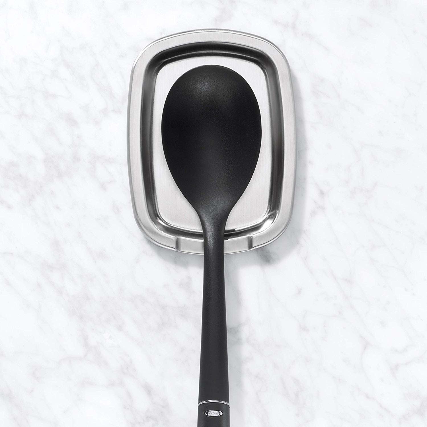 https://cdn.shoplightspeed.com/shops/633447/files/17805985/1500x4000x3/oxo-oxo-simple-stainless-steel-spoon-rest.jpg