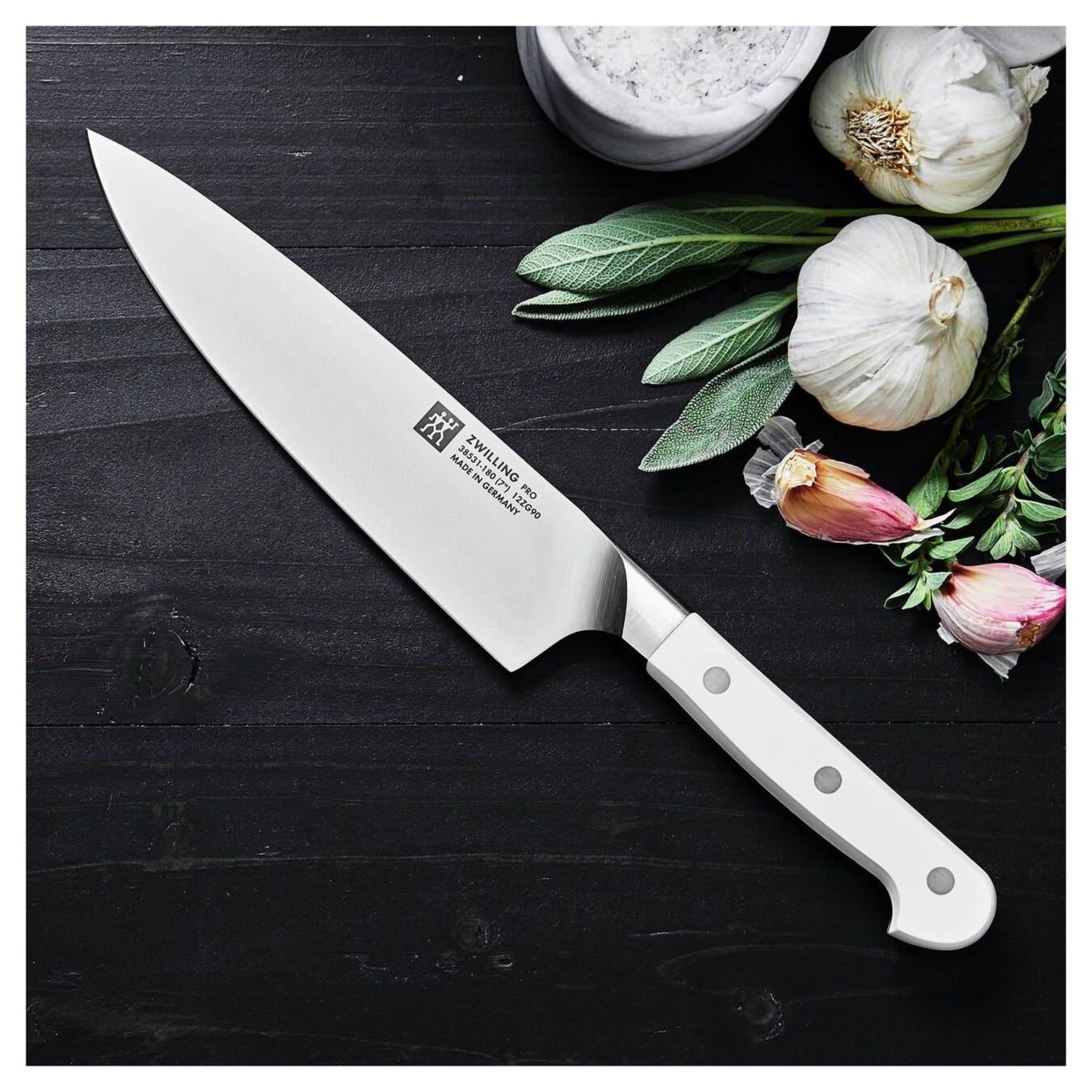 https://cdn.shoplightspeed.com/shops/633447/files/48401752/1500x4000x3/zwilling-ja-henckels-7-pro-chefs-knife-with-white.jpg