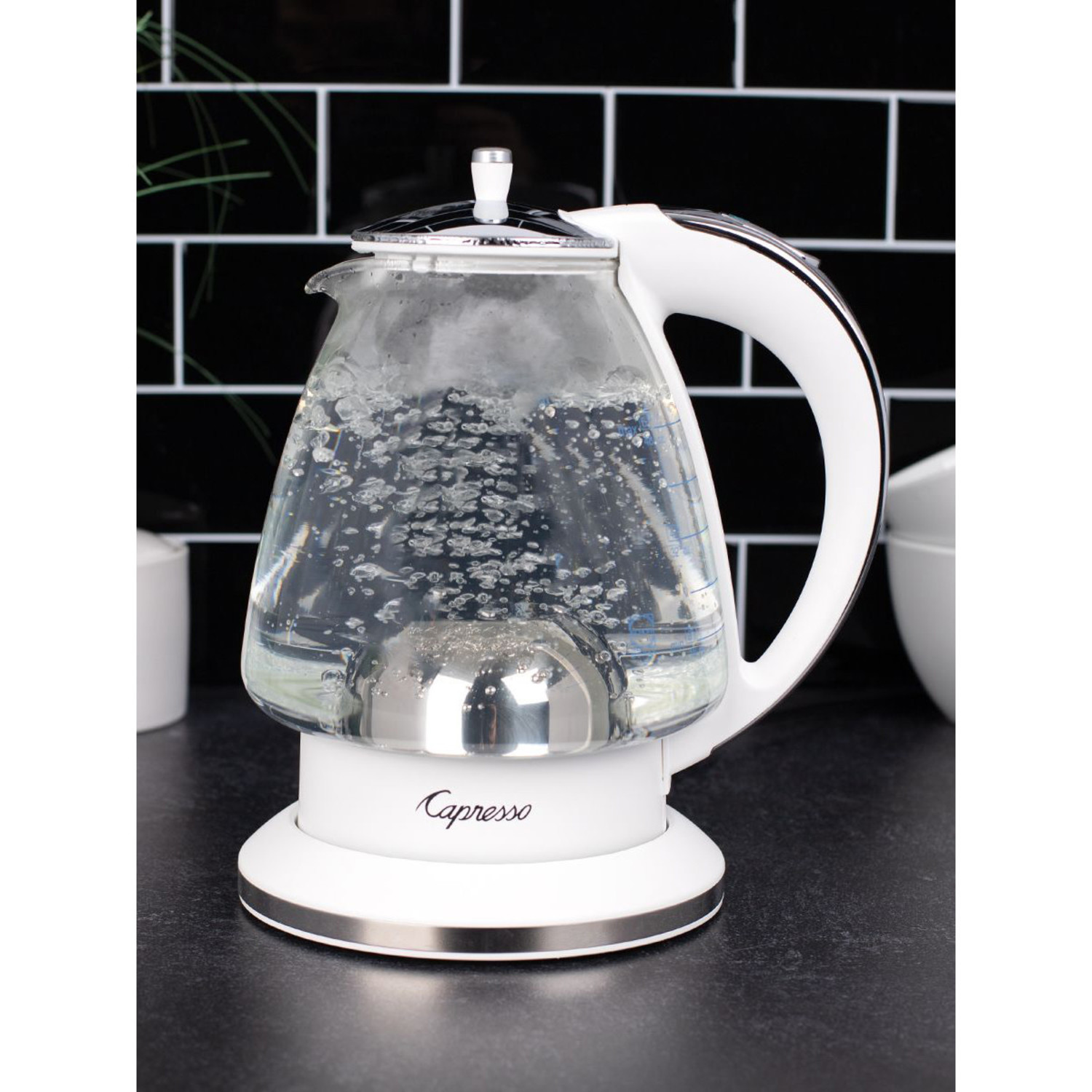 https://cdn.shoplightspeed.com/shops/633447/files/51726250/1500x4000x3/white-glass-electric-kettle.jpg