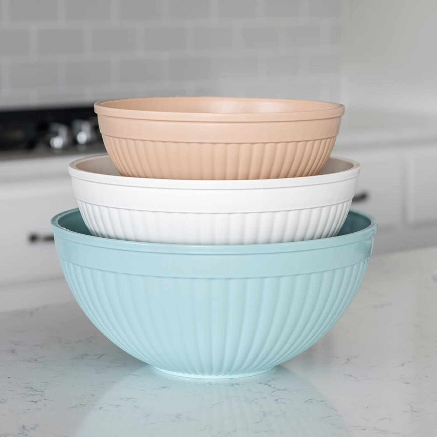 https://cdn.shoplightspeed.com/shops/633447/files/55181791/1500x4000x3/nordic-ware-taupe-turquoise-white-mixing-bowls-set.jpg