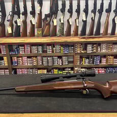 Tikka M695 300 win w/Leupold scope