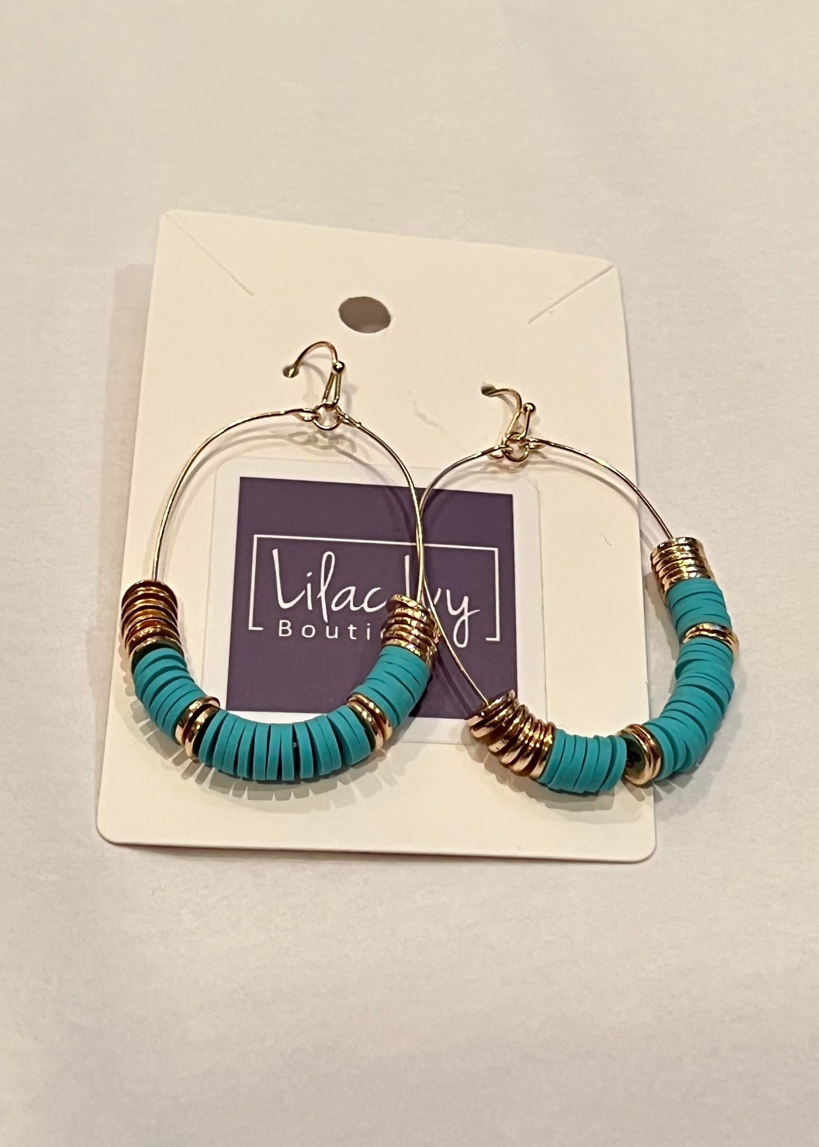What's Hot Teal and gold earrings 2"