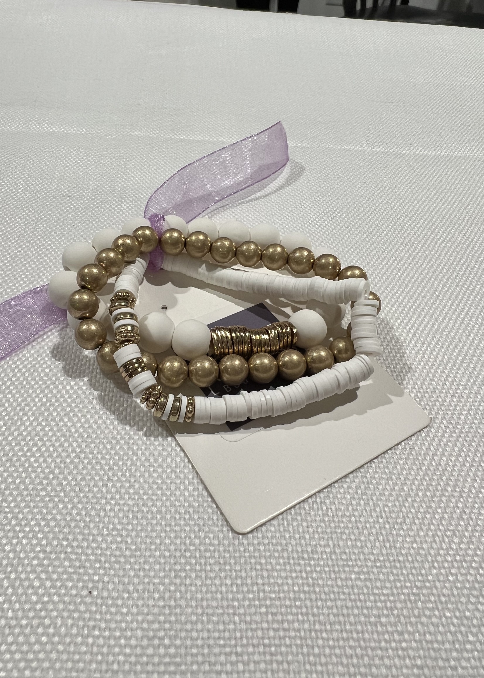 White rubber and gold 3 bracelet