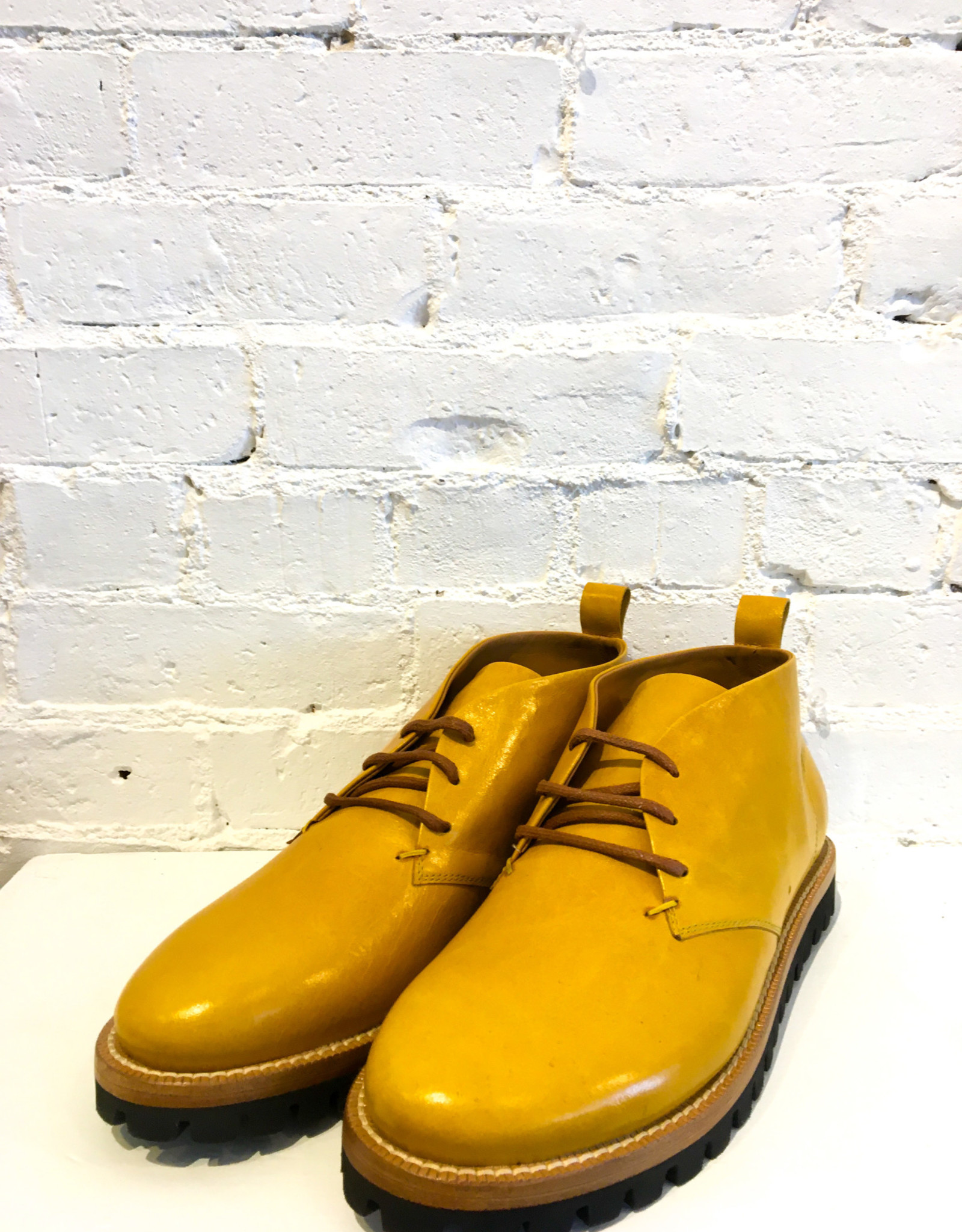 yellow lace up boots