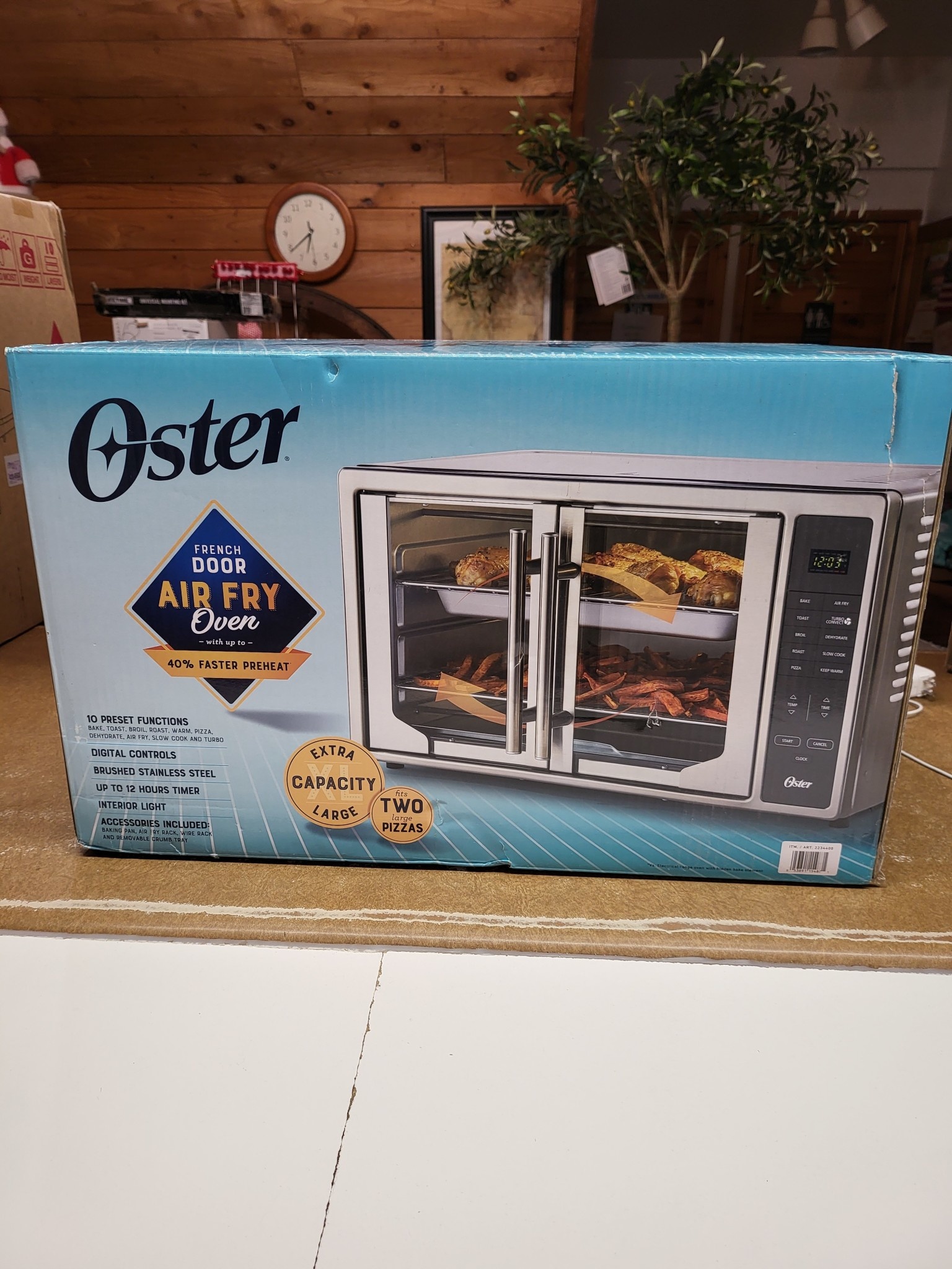 *Opened Oster Digital French Door with Air Fry Countertop Oven D3