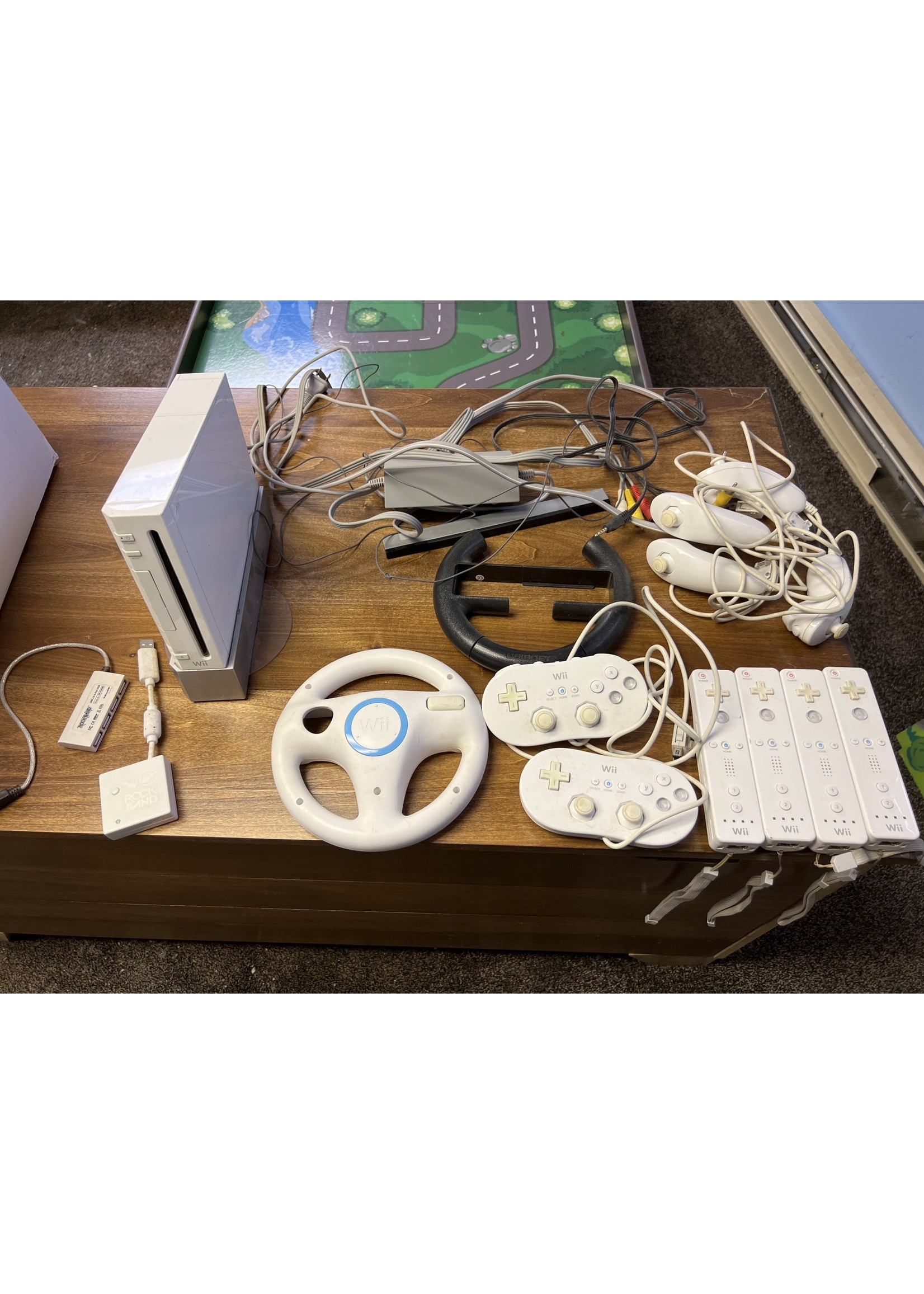 Wii Console with attachments and controllers