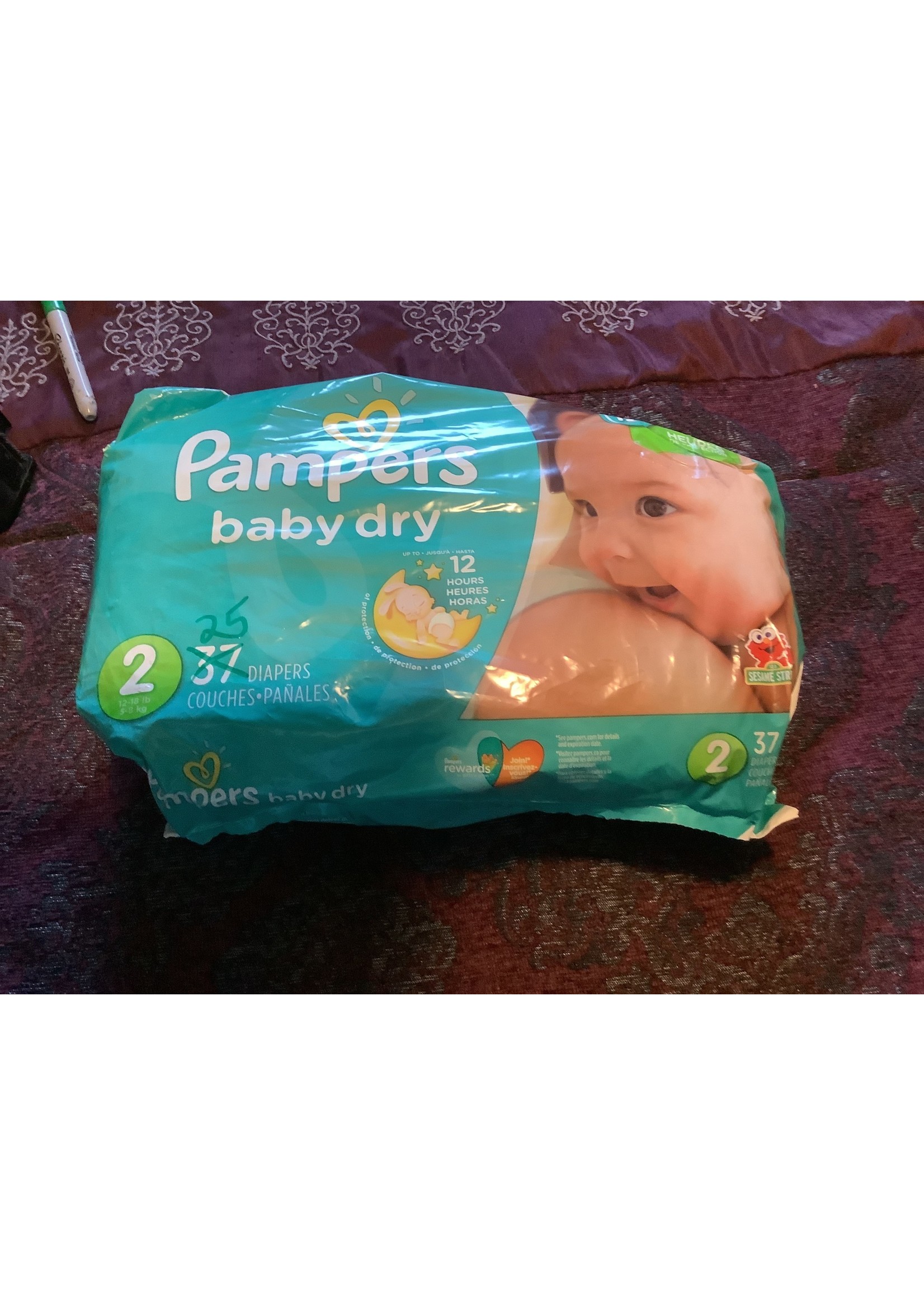 25 Pampers baby dry  22 hr sz 2 (12 - 18 lb) *open pkg