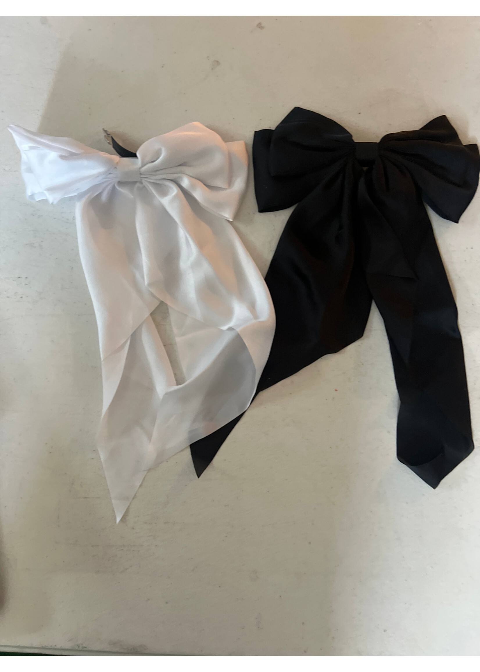 Two oversized bows NWOT black & white with clips