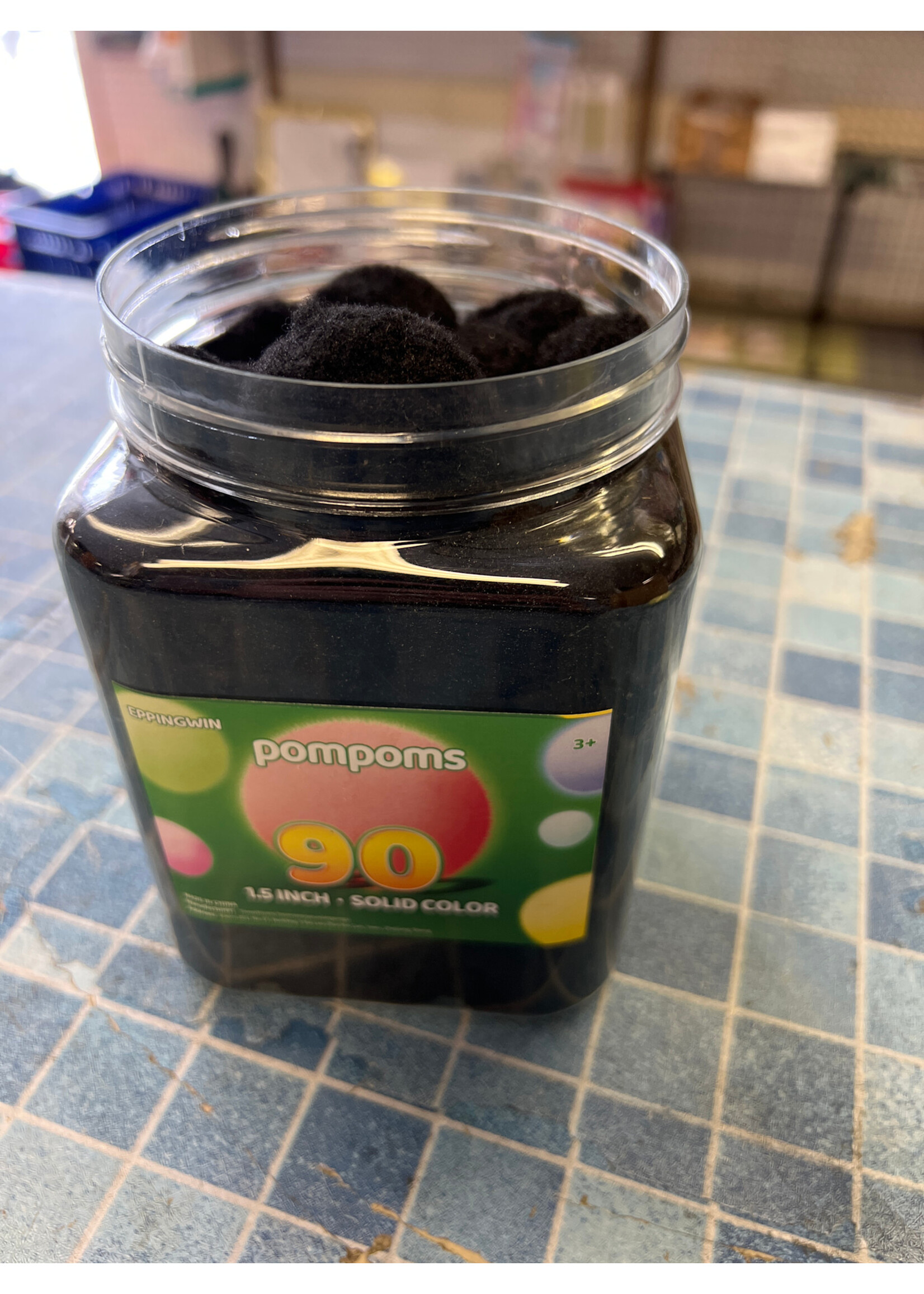 Open container- Eppingwin ~80ct solid black 1.5” pompoms