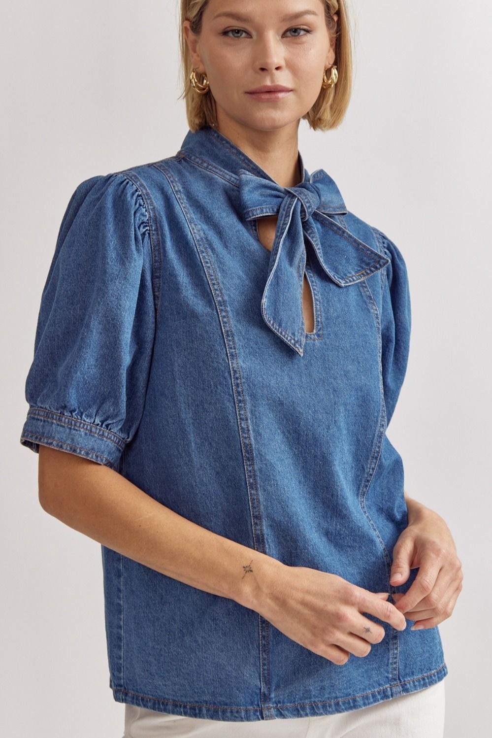 Ganni Striped bow-trimmed peplum denim blouse - ShopStyle Tops