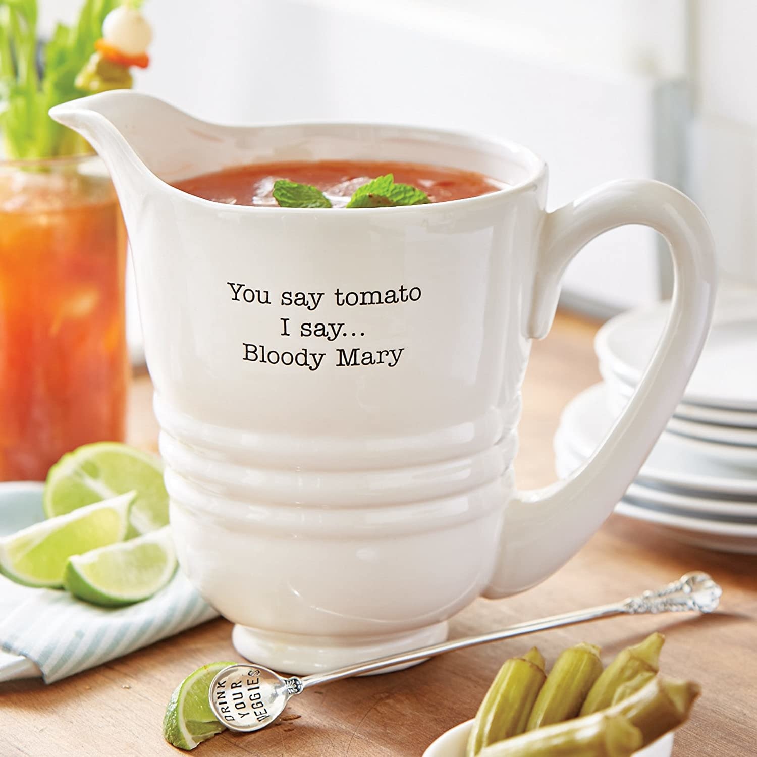 https://cdn.shoplightspeed.com/shops/633980/files/43800179/mud-pie-you-say-tomato-i-say-bloody-mary-pitcher-s.jpg