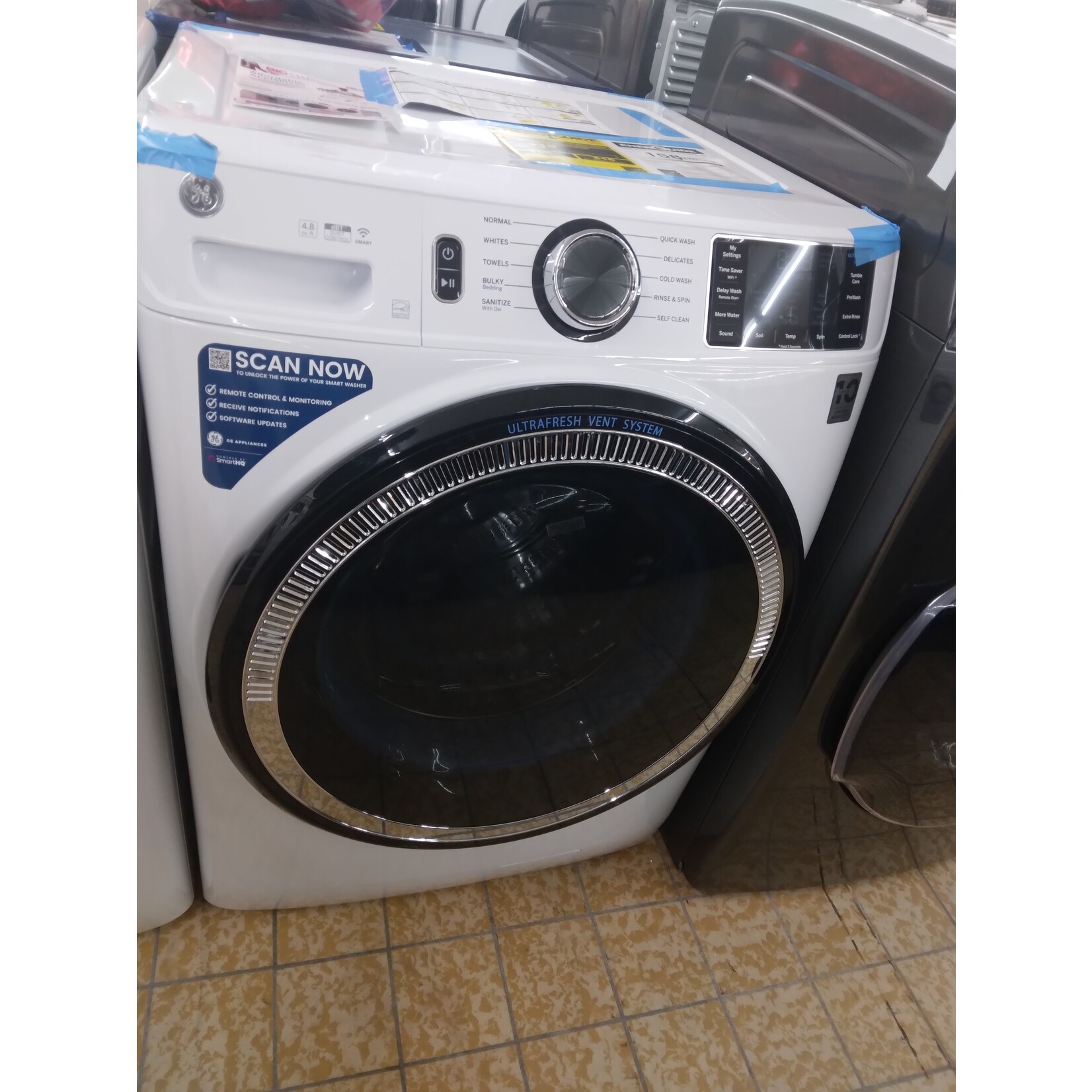 GE GFW550SSNWW GE UESD  32 in. 4.8 cu. ft. White Front Load Washing Machine with OdorBlock UltraFresh Vent System and Sanitize with Oxi