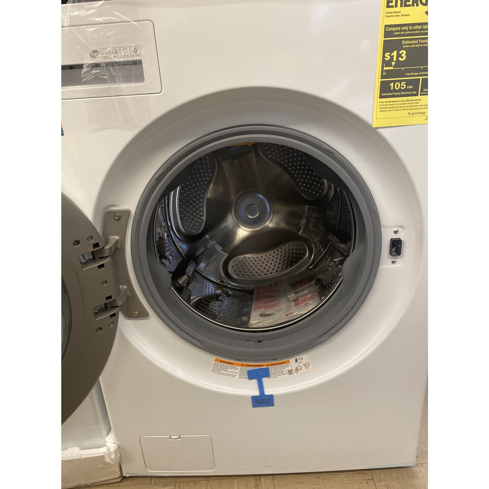 LG #WKEX200HWA - LG 27 in. White Single Unit WashTower Laundry Center with 4.5 cu. ft. Washer and 7.4 cu. ft. Electric Dryer
