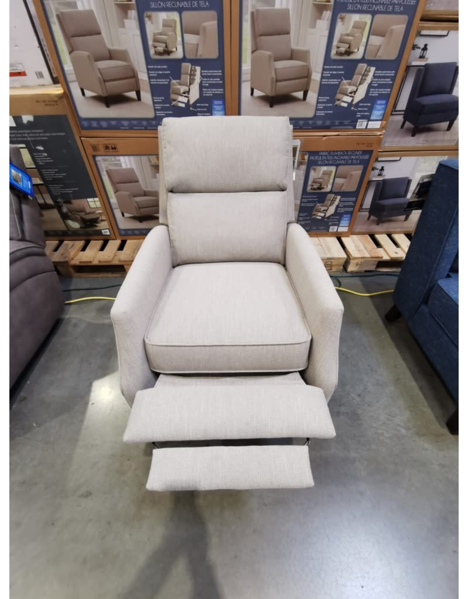 Sit back and relax in this reclining chair. Simply push back to recline, no levers or buttons required. With classic, clean limes, Synergy Home Tiegan Fabric Pushback Recliner makes it the perfect addition to any room.
