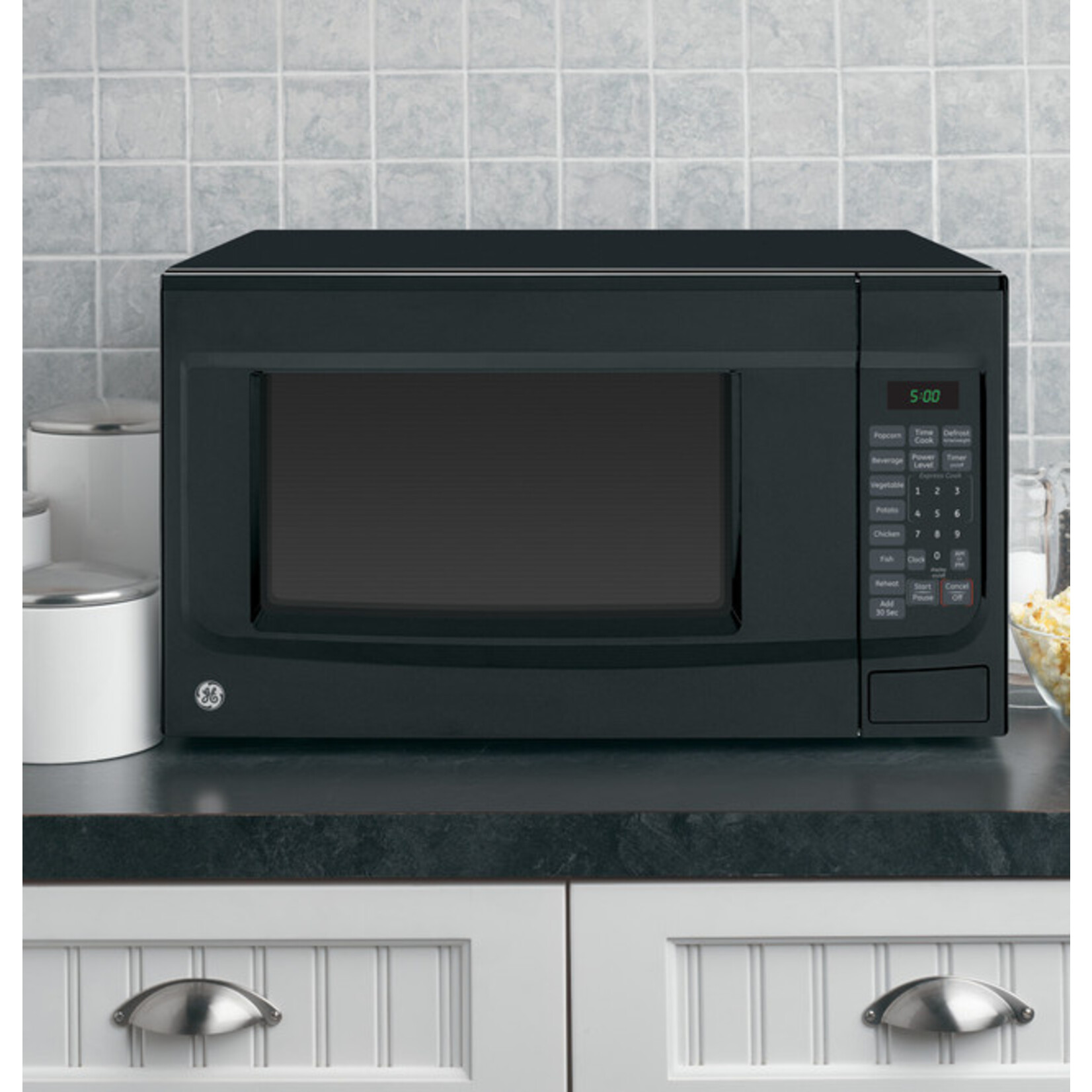 GE #JES1460DSBB GE®  1100 Watts  1.4 Cu. Ft. Countertop Microwave Oven