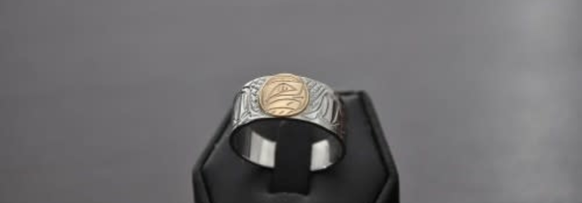 Hand Carved Silver Ring with Gold carved Eagle Inlay by Nancy Dawson