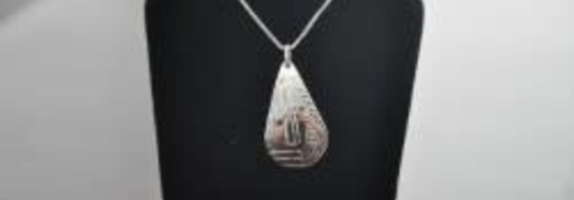 Silver Carved Raven Pendant by Vincent Henson