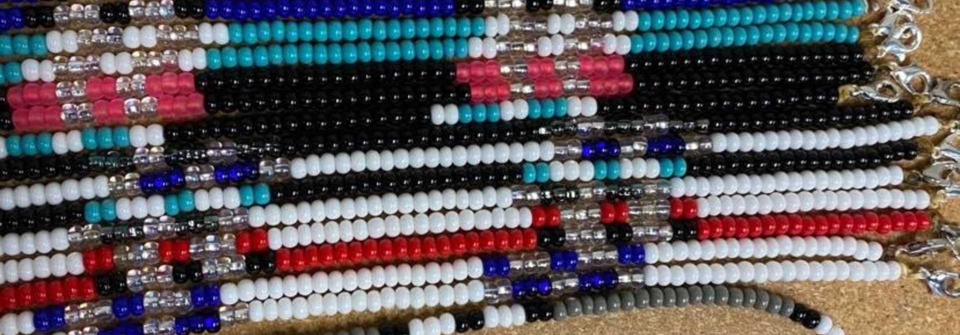 Assorted Beaded Mask Holders by Roxanne George