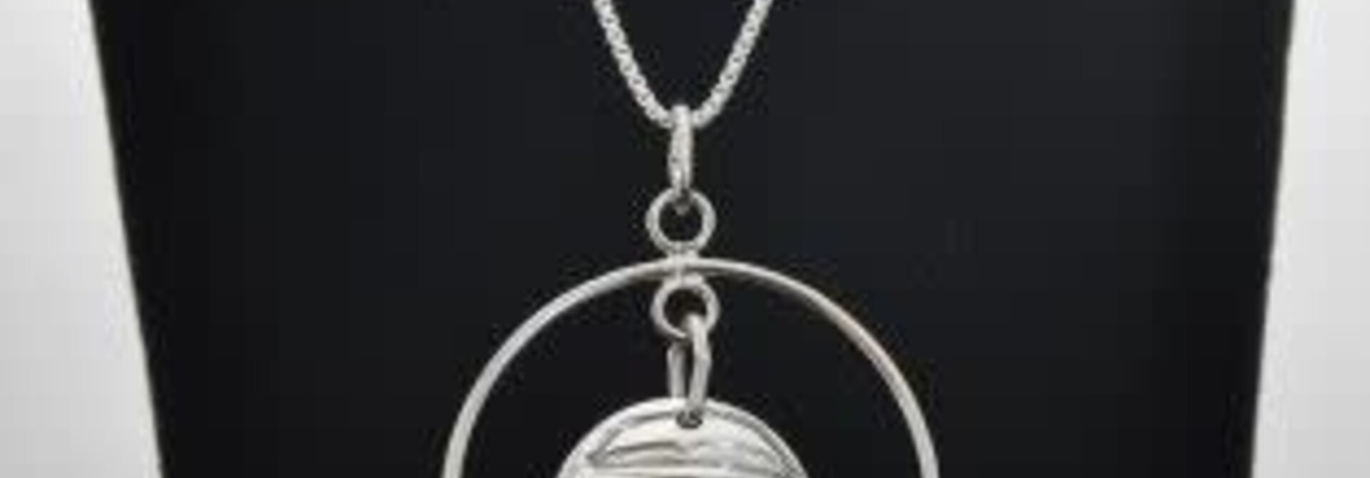 Silver Carved Eagle Pendant by Nancy Dawson