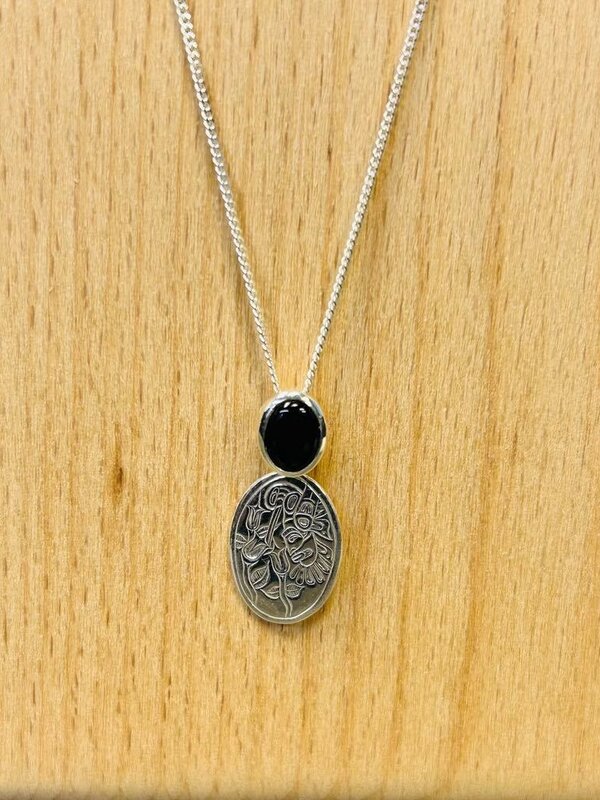Silver Cast Pendant w Black onyx- Hummingbird Transforming