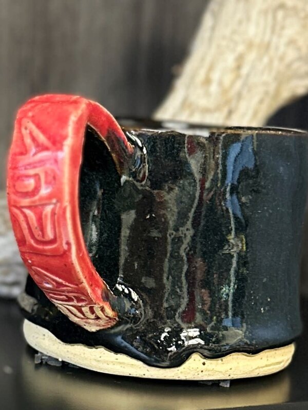 Black Pottery Mug by Cynthia Robinson