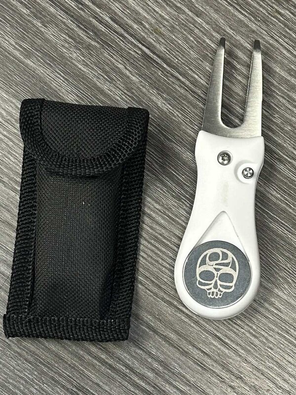 Skull Divot and Ball Marker by Patricia Mather