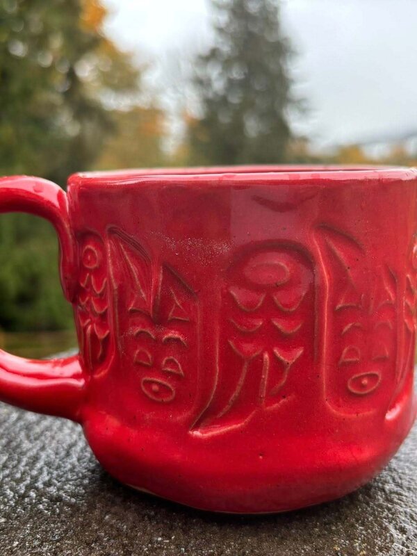 Pottery by Cynthia Robison -  Red mug with Eagle Feathers