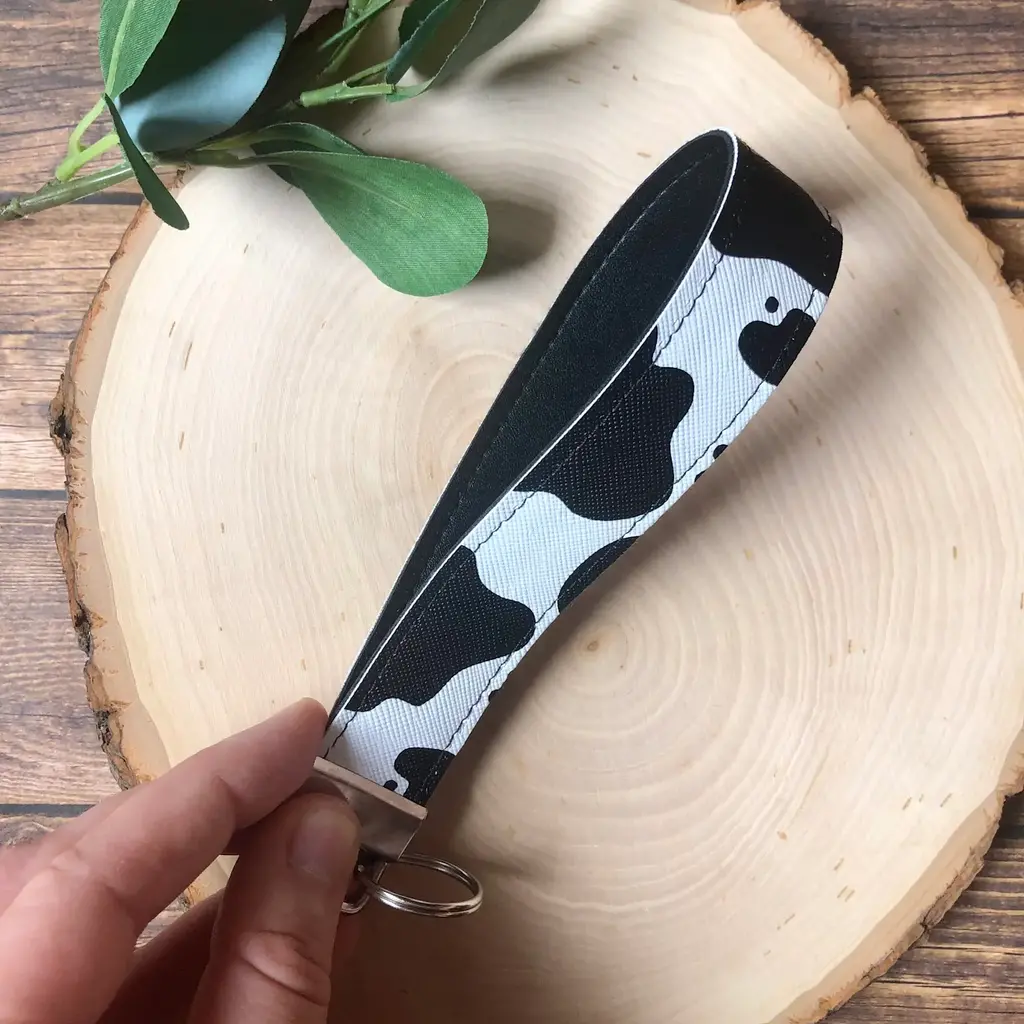 South Coast Sewn Cow Print Keychain Wristlet Faux Leather - Black